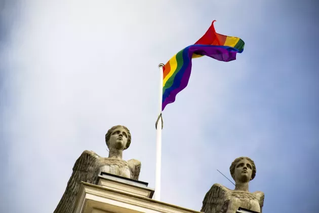 The rainbow-flag on top of the University building.